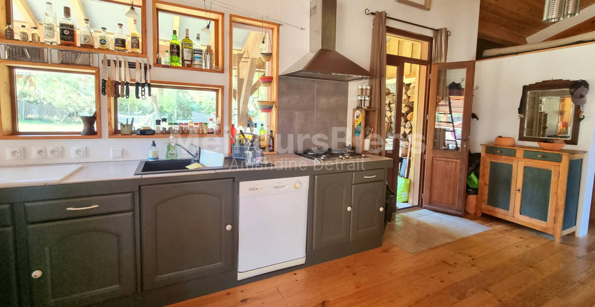 Maison en bois de 100 m², au calme, terrain 745 m²