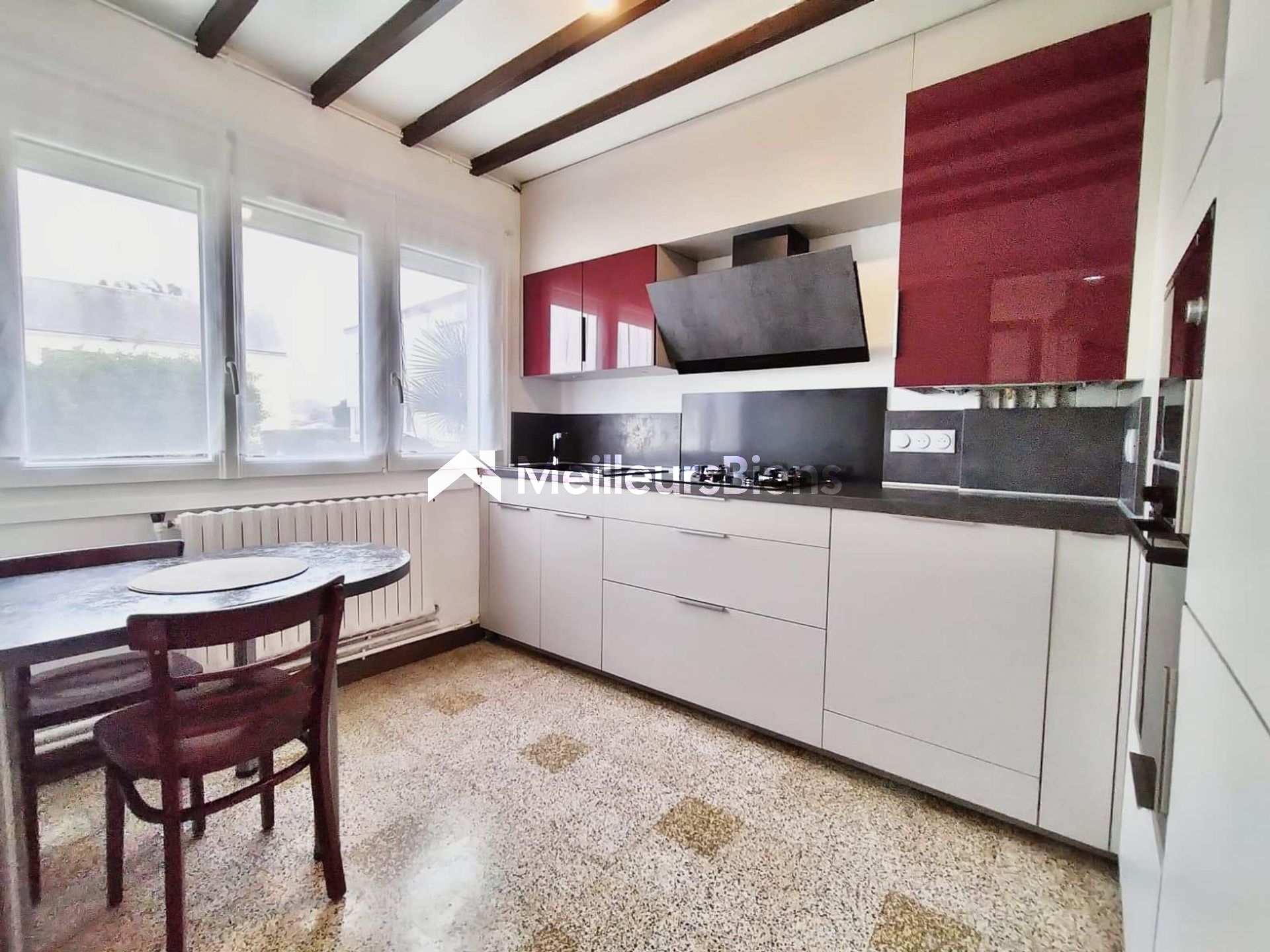 Maison 4 pièces de 75 m² au calme avec garage, sous-sol et terrain de 356 m²