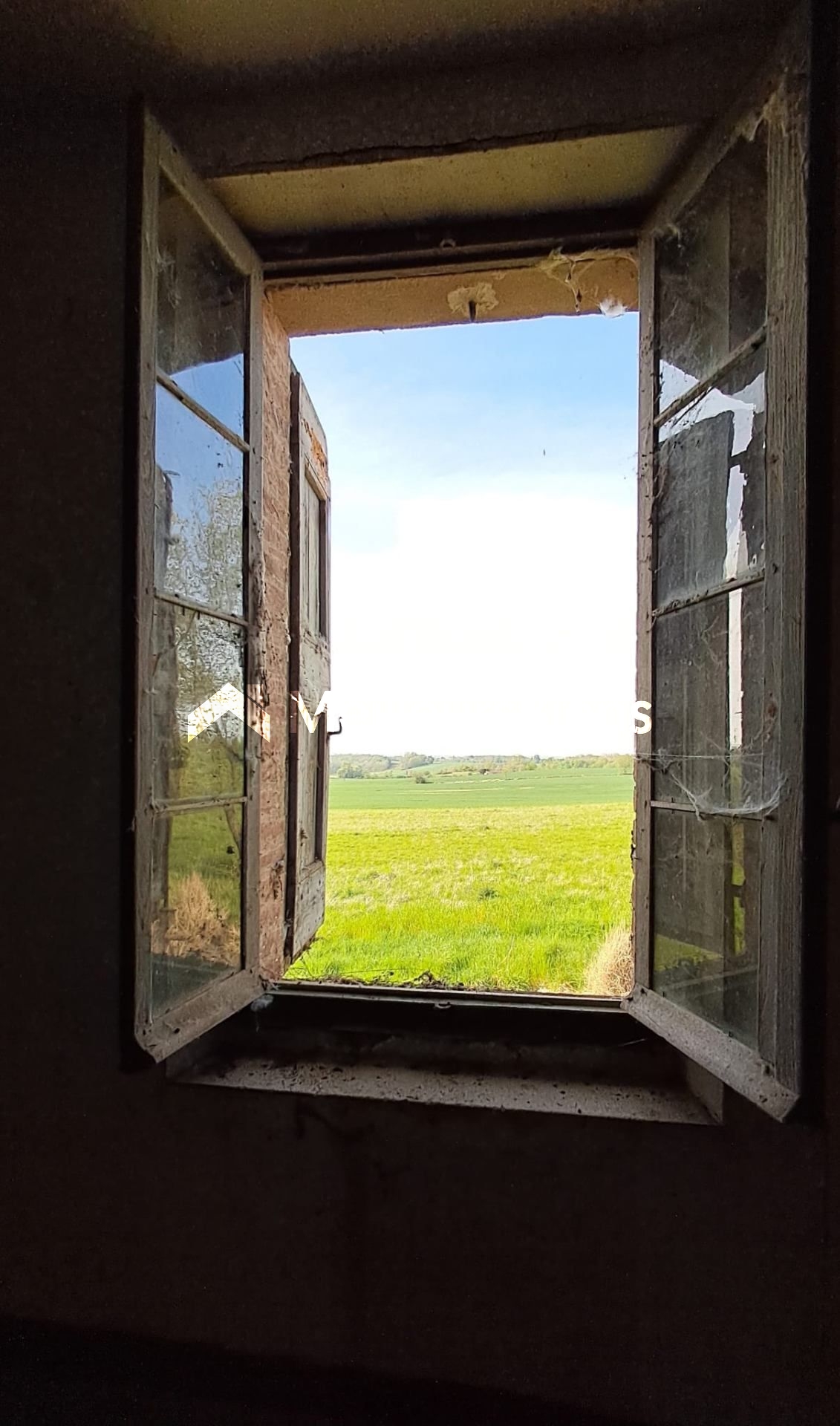 Grand corps de ferme avec dépendances en cours de réhabilitation