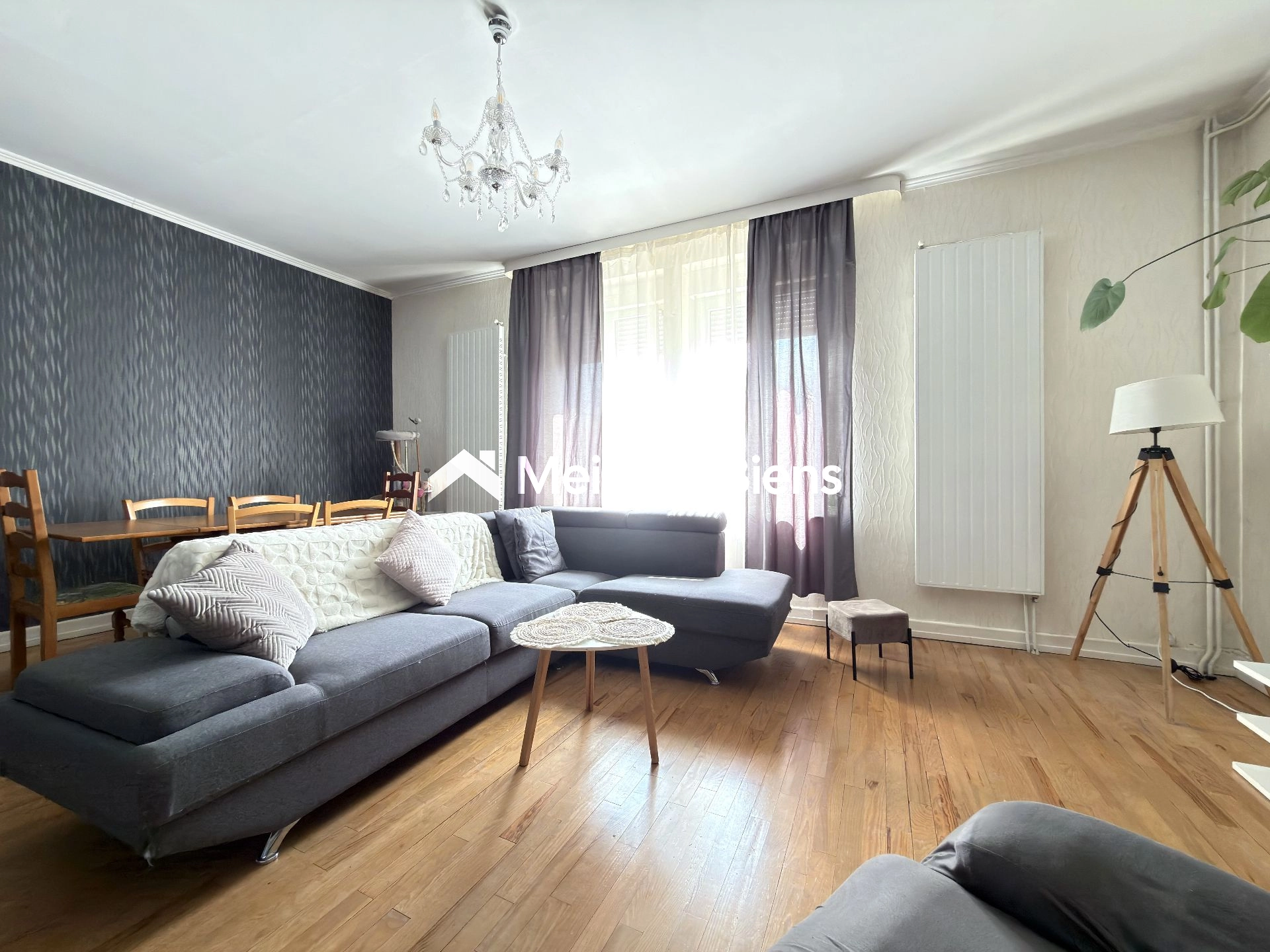 Appartement 4 pièces 90 m² avec 3 chambres, jardin privatif avec terrasse, garage et caves
