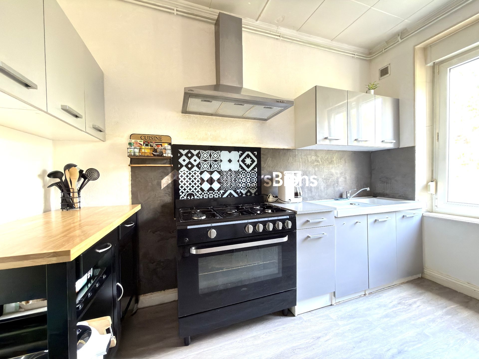 Appartement 4 pièces 90 m² avec 3 chambres, jardin privatif avec terrasse, garage et caves
