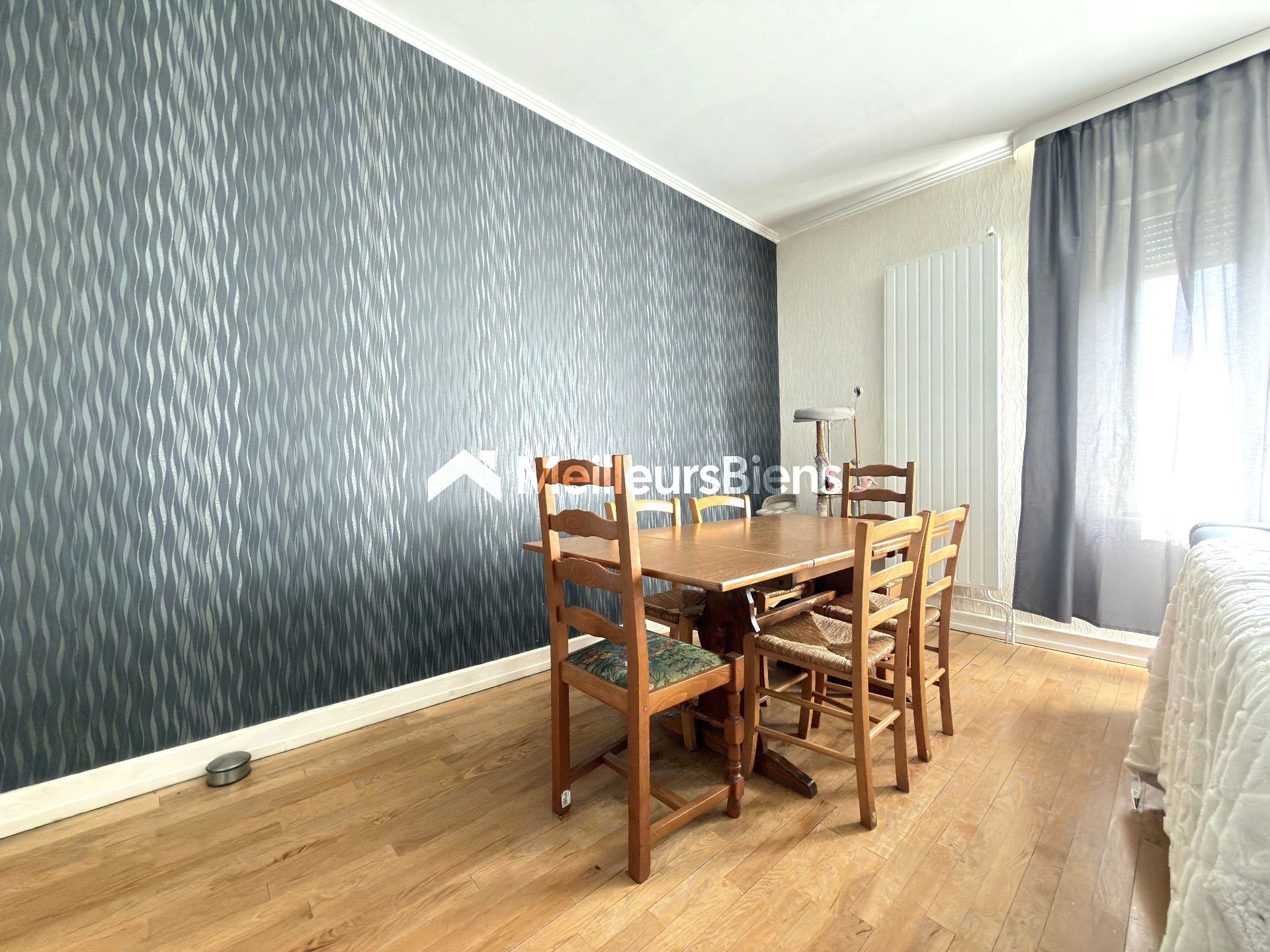 Appartement 4 pièces 90 m² avec 3 chambres, jardin privatif avec terrasse, garage et caves