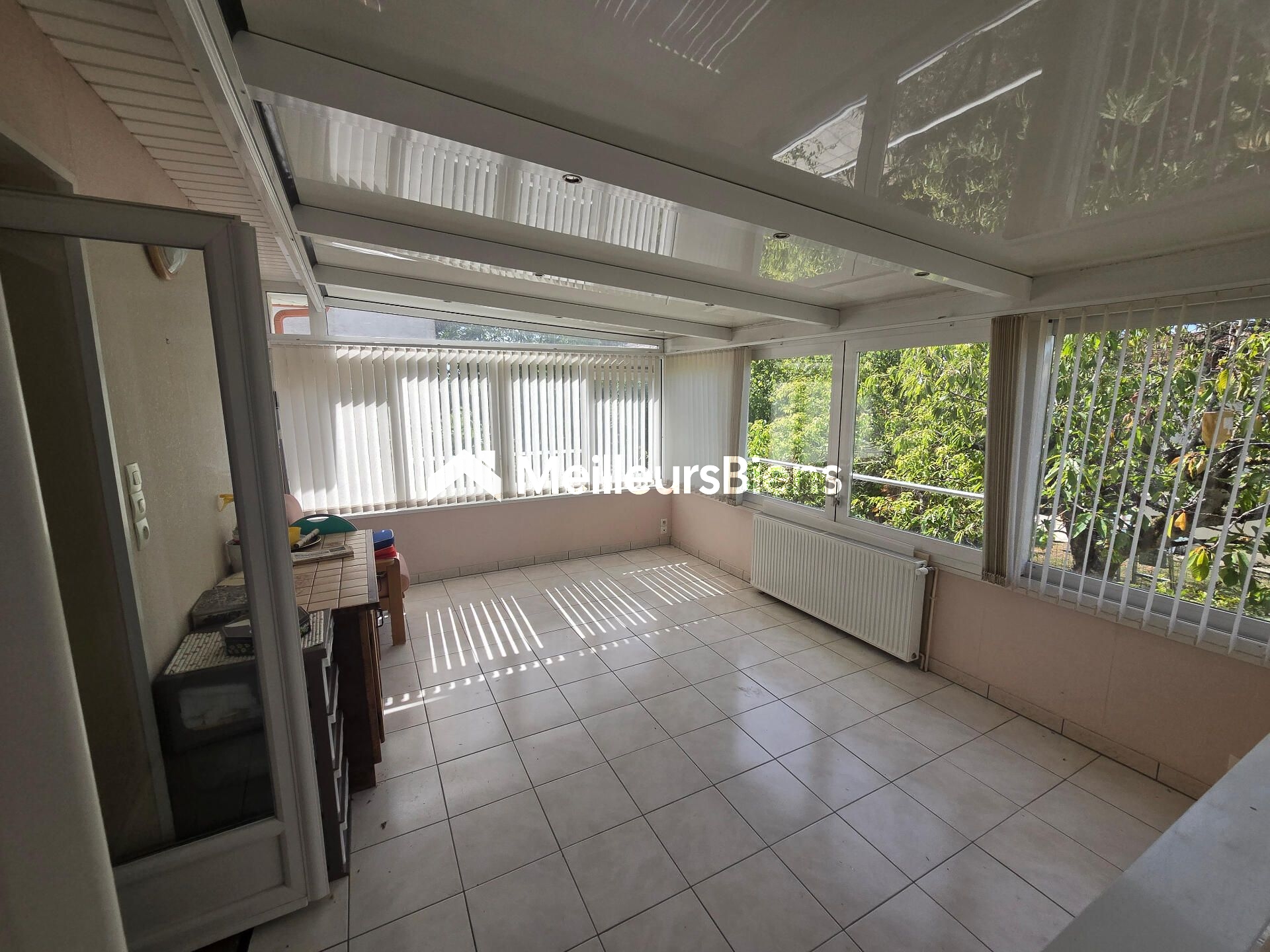 Maison 4 pièces 80 m² avec véranda et sous-sol complet à Neuilly-Crimolois